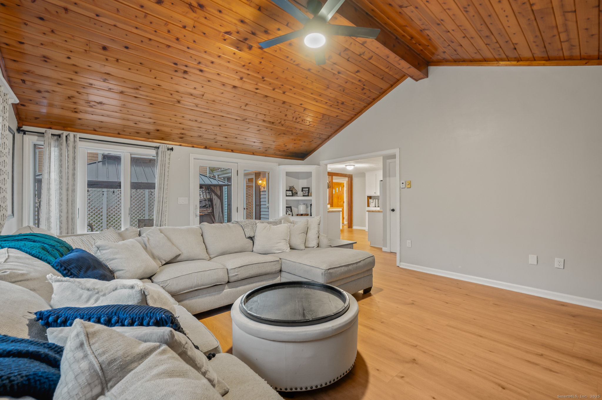 24 William Street Portland, CT 06480 - Photo 24 of 35 a living room with furniture and a wooden floor