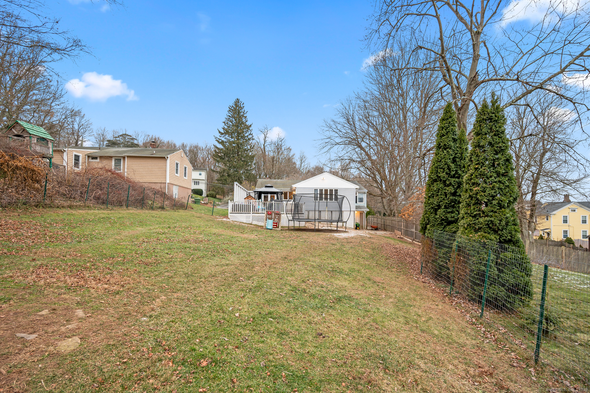 24 William Street Portland, CT 06480 - Photo 30 of 35 a view of a house with yard and sitting area