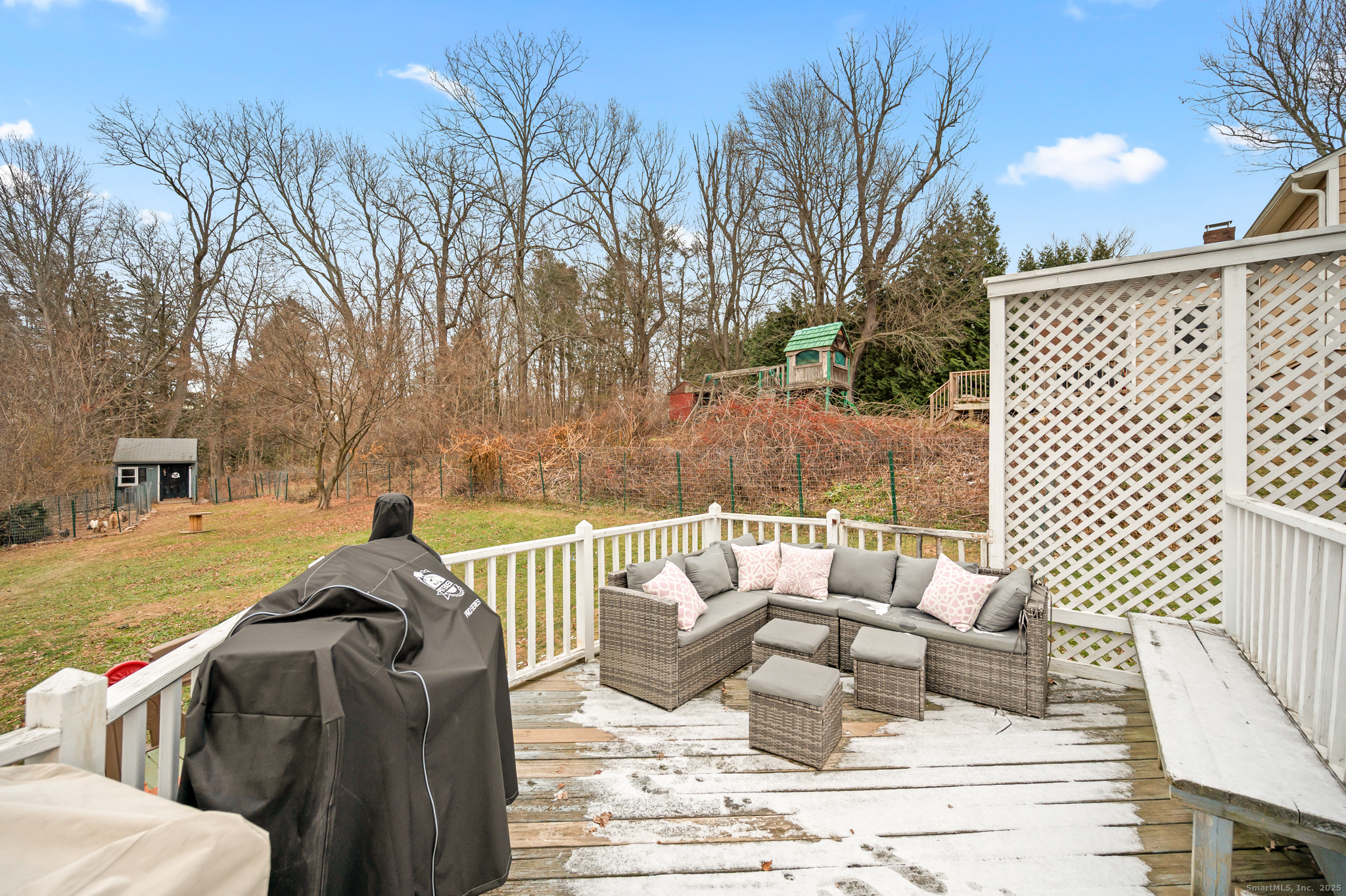 24 William Street Portland, CT 06480 - Photo 31 of 35 a view of a patio with couches chairs and wooden floor