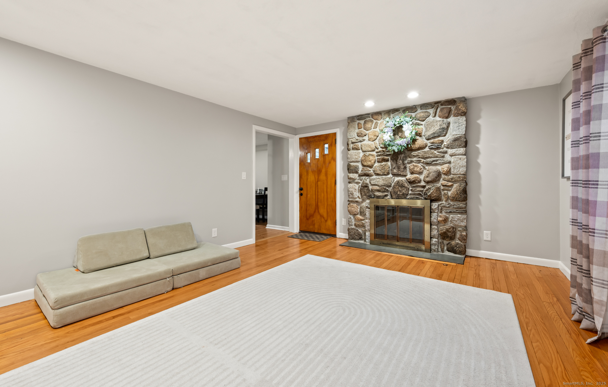 24 William Street Portland, CT 06480 - Photo 9 of 35 a bedroom with a bed and a couch