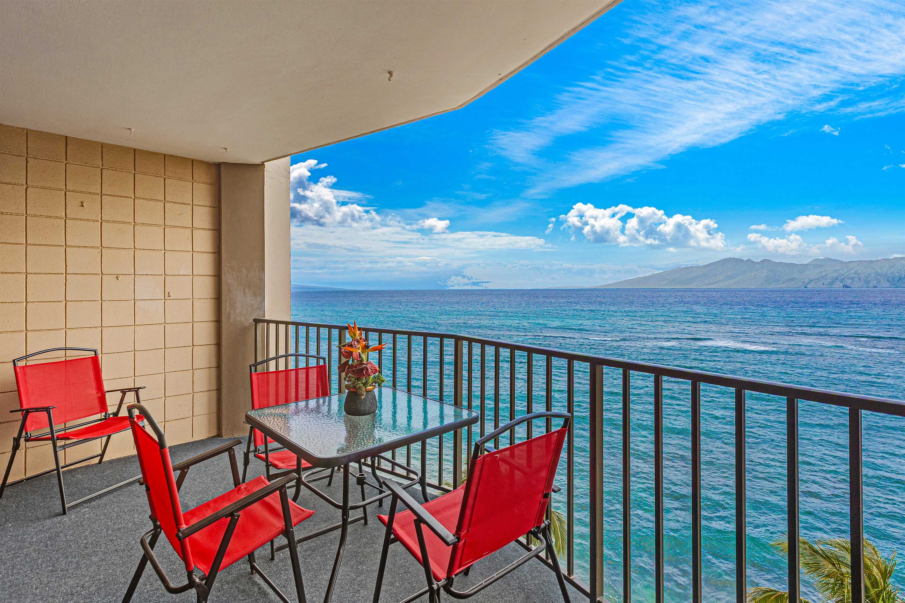 4327 Lower Honoapiilani Road, Unit 808 Lahaina, HI 96761 - Photo 1 of 35 a view of a dining room with furniture a chandelier and wooden floor