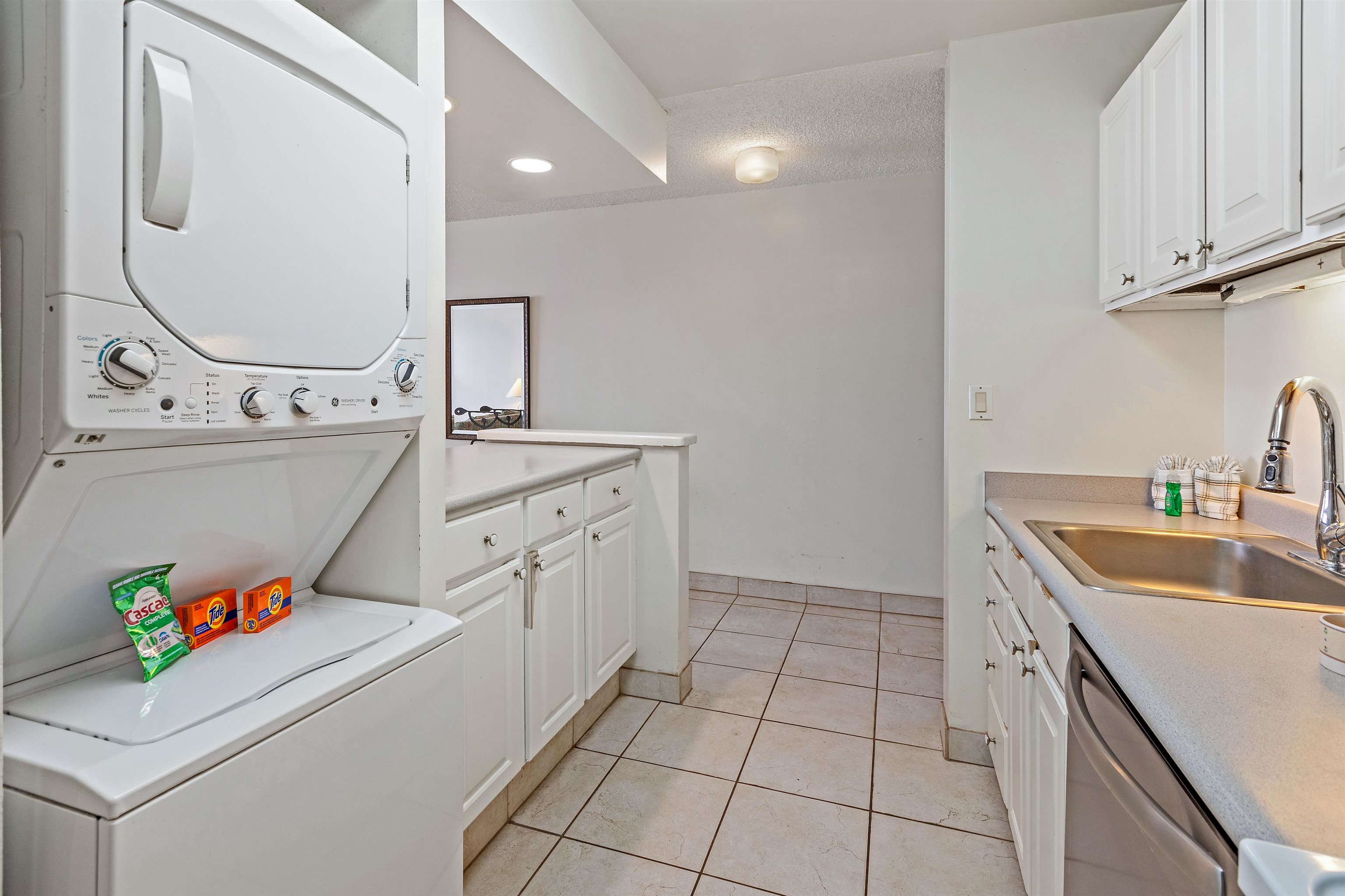 4327 Lower Honoapiilani Road, Unit 808 Lahaina, HI 96761 - Photo 13 of 35 a utility room with sink dryer and washer