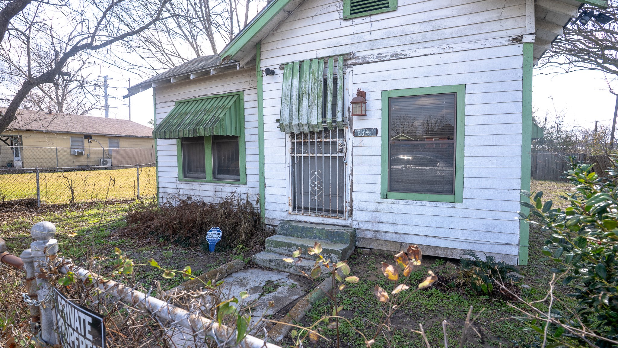 8808 Leander Street Houston, TX 77012 - Photo 11 of 12 a view of a house with a yard