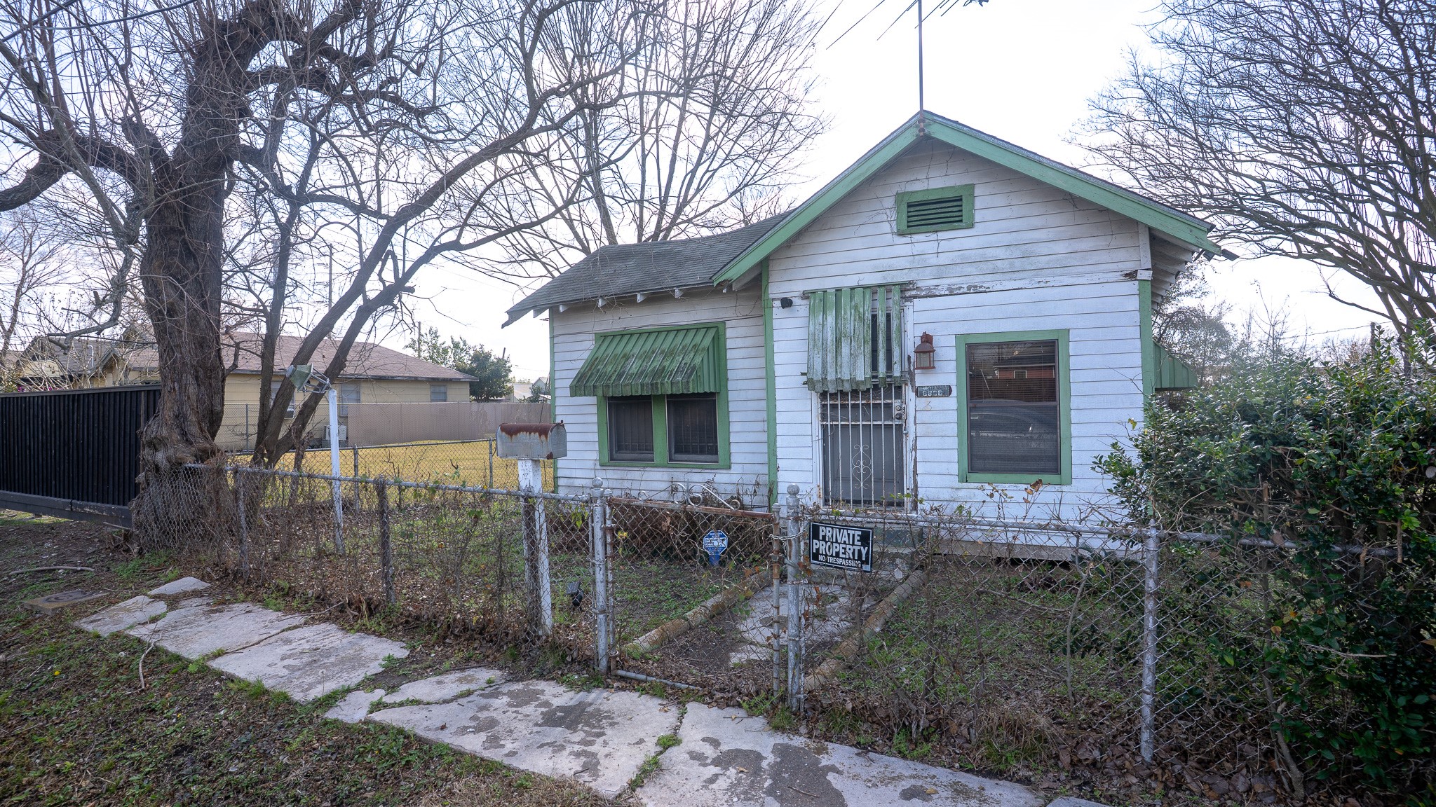 8808 Leander Street Houston, TX 77012 - Photo 12 of 12 a front view of a house with garden