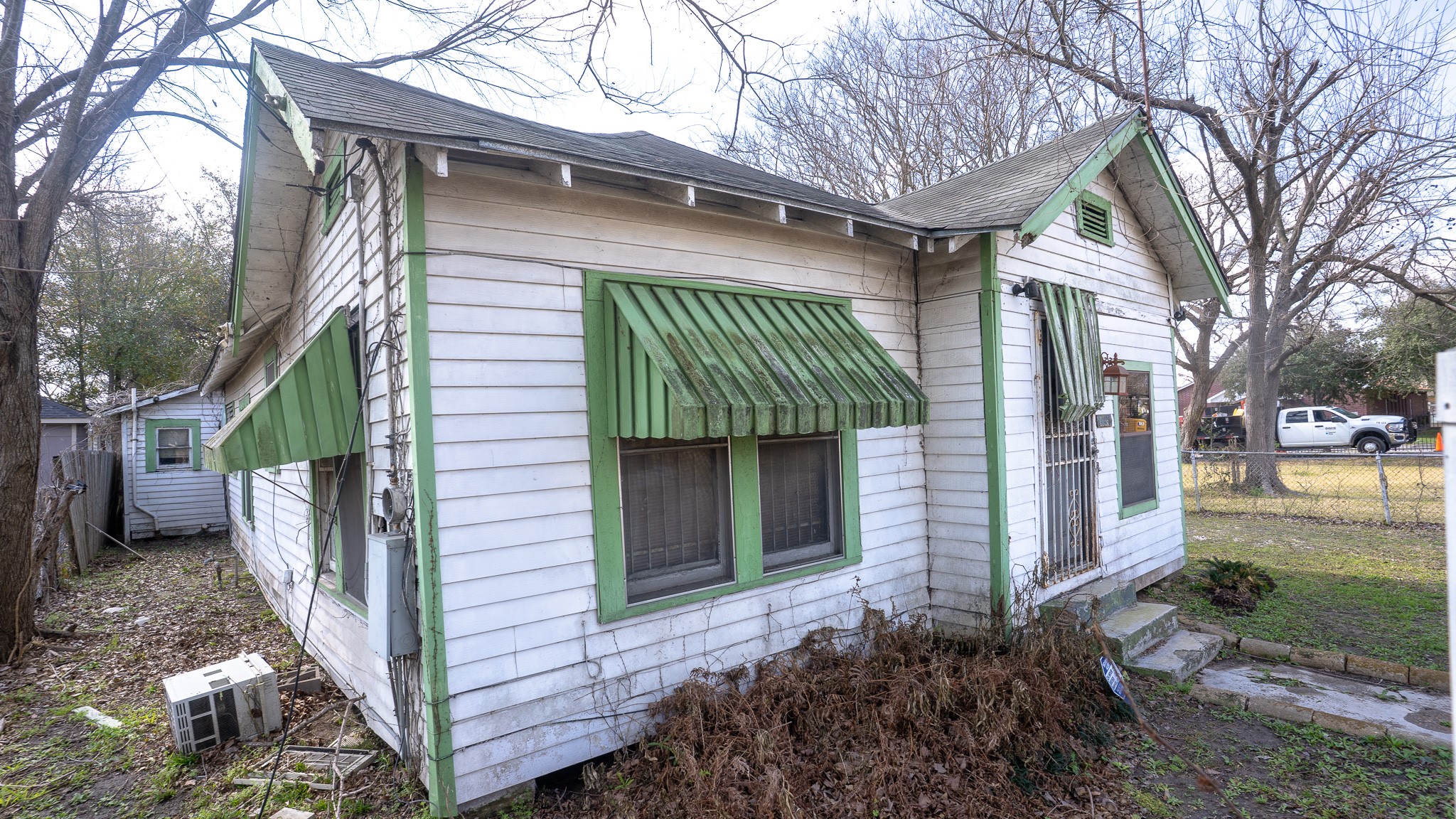 8808 Leander Street Houston, TX 77012 - Photo 4 of 12 a view of a house with a yard