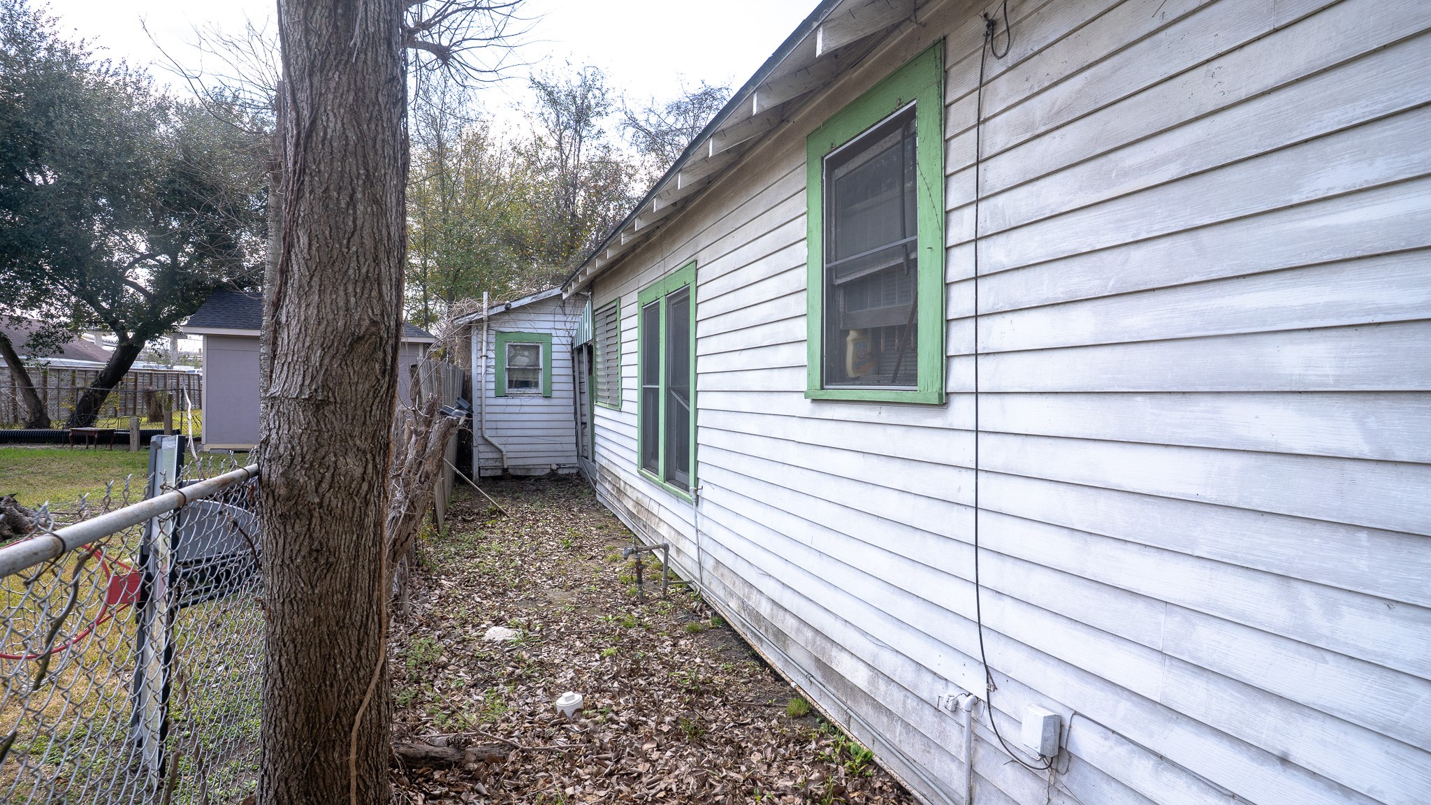 8808 Leander Street Houston, TX 77012 - Photo 5 of 12 a view of a house with a backyard