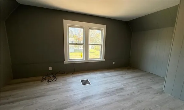 an empty room with a door