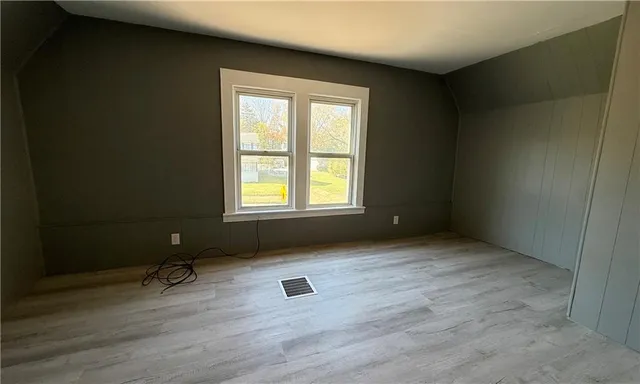 an empty room with a door