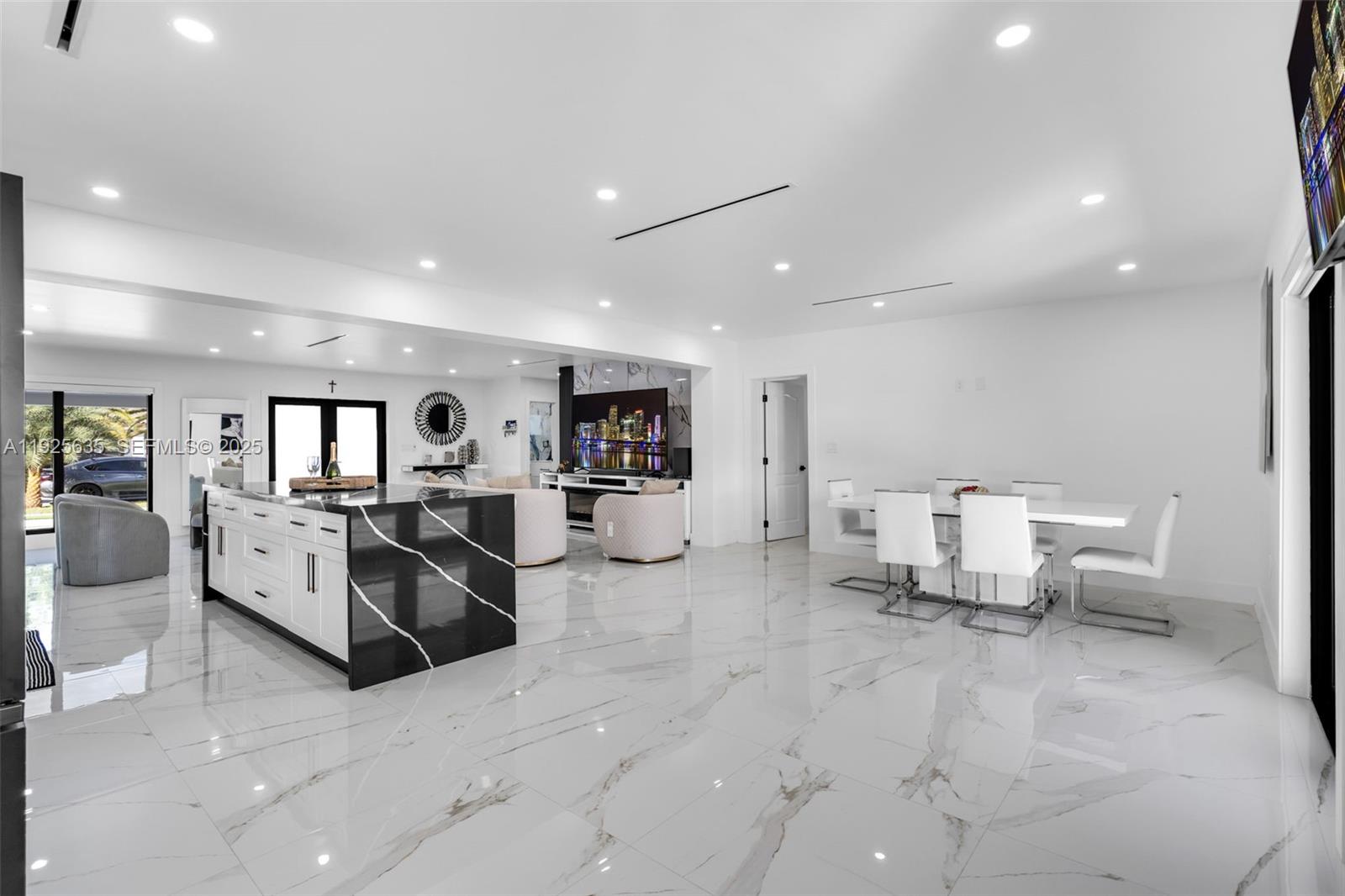 864 West 69th Place Hialeah, FL 33014 - Photo 13 of 45 a living room with furniture and white walls