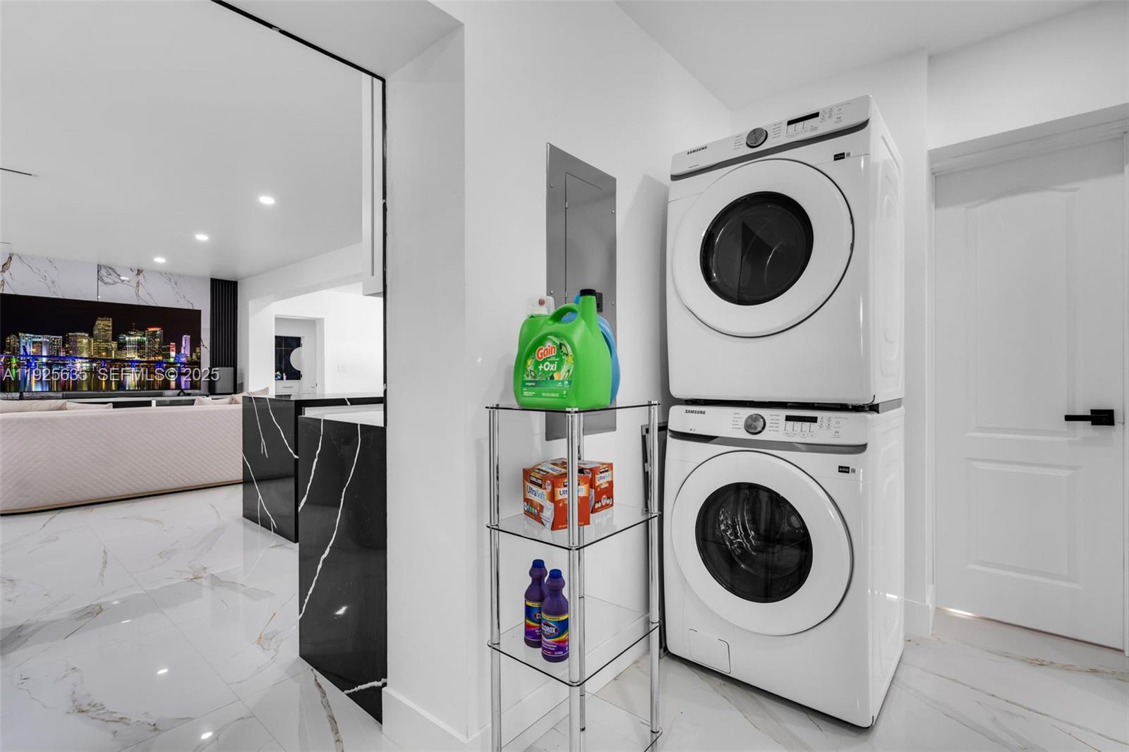 864 West 69th Place Hialeah, FL 33014 - Photo 30 of 45 a living room with furniture and a washer dryer