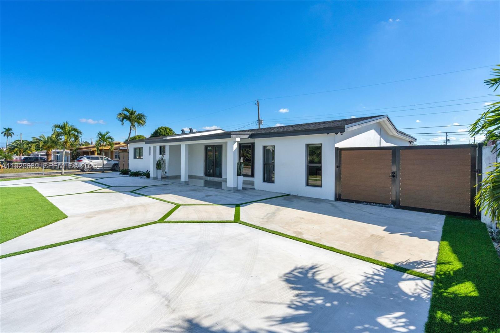 864 West 69th Place Hialeah, FL 33014 - Photo 3 of 45 a view of a house with entertaining space