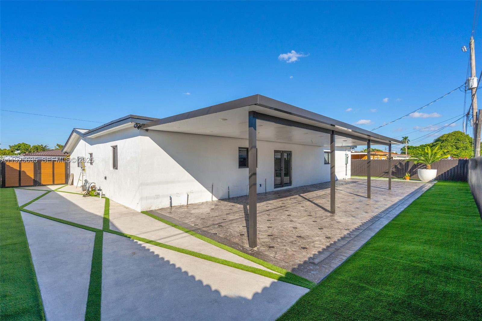 864 West 69th Place Hialeah, FL 33014 - Photo 36 of 45 a front view of a house with garden