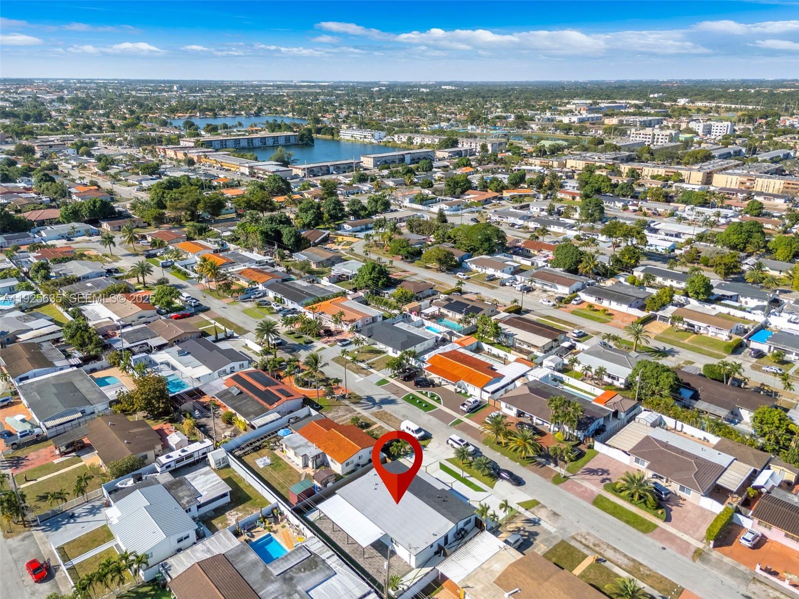 864 West 69th Place Hialeah, FL 33014 - Photo 4 of 45 an aerial view of residential houses with city view