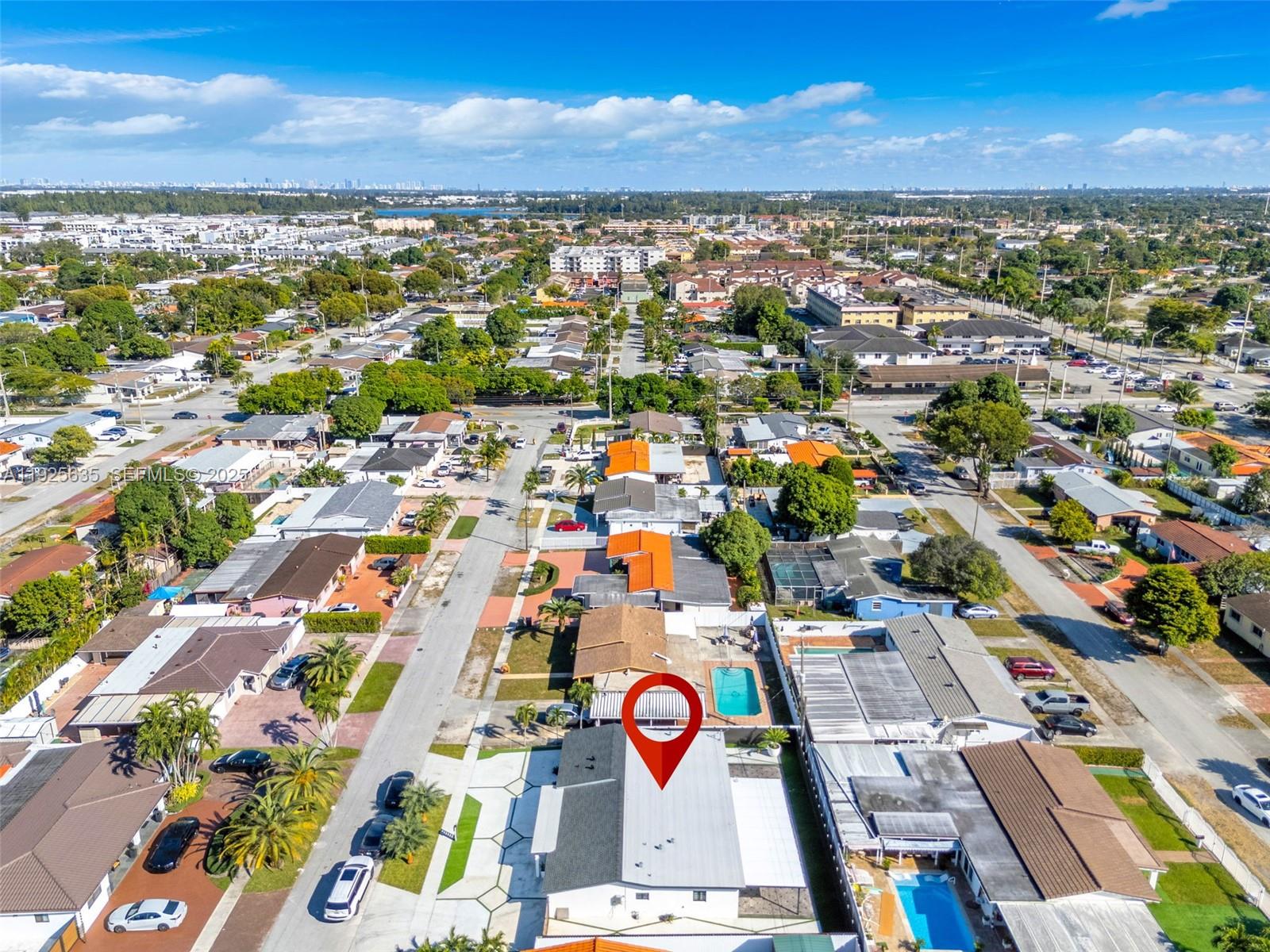 864 West 69th Place Hialeah, FL 33014 - Photo 42 of 45 an aerial view of residential houses with outdoor space