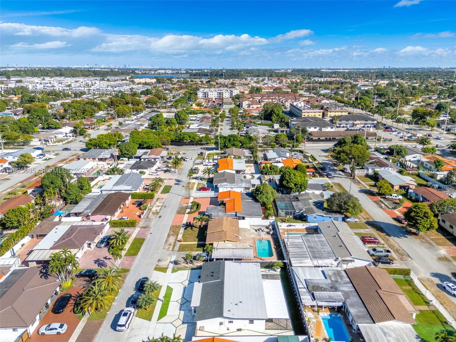 864 West 69th Place Hialeah, FL 33014 - Photo 43 of 45 an aerial view of residential houses with outdoor space