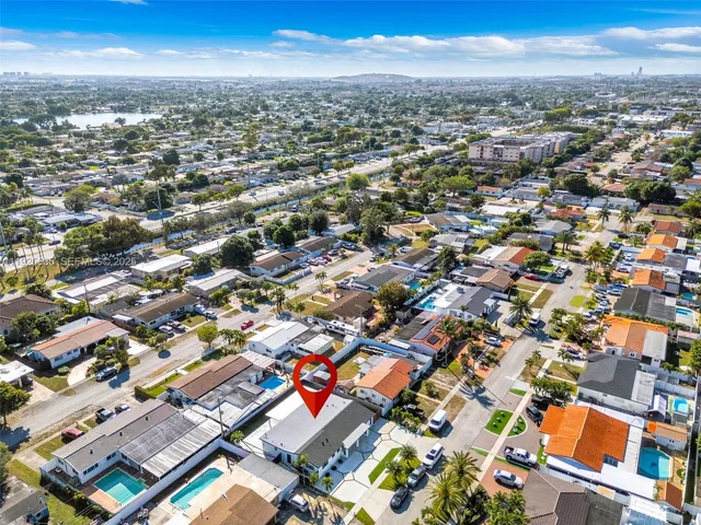an aerial view of a city with lots of residential buildings