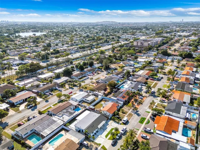 an aerial view of a city with lots of residential buildings