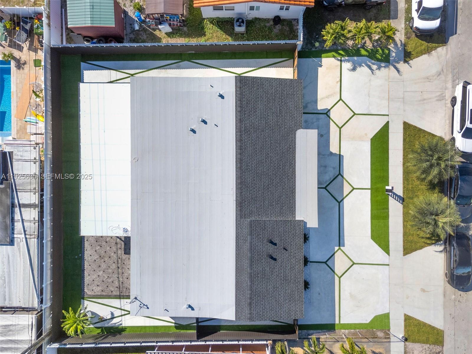 864 West 69th Place Hialeah, FL 33014 - Photo 9 of 45 an aerial view of residential houses with outdoor space
