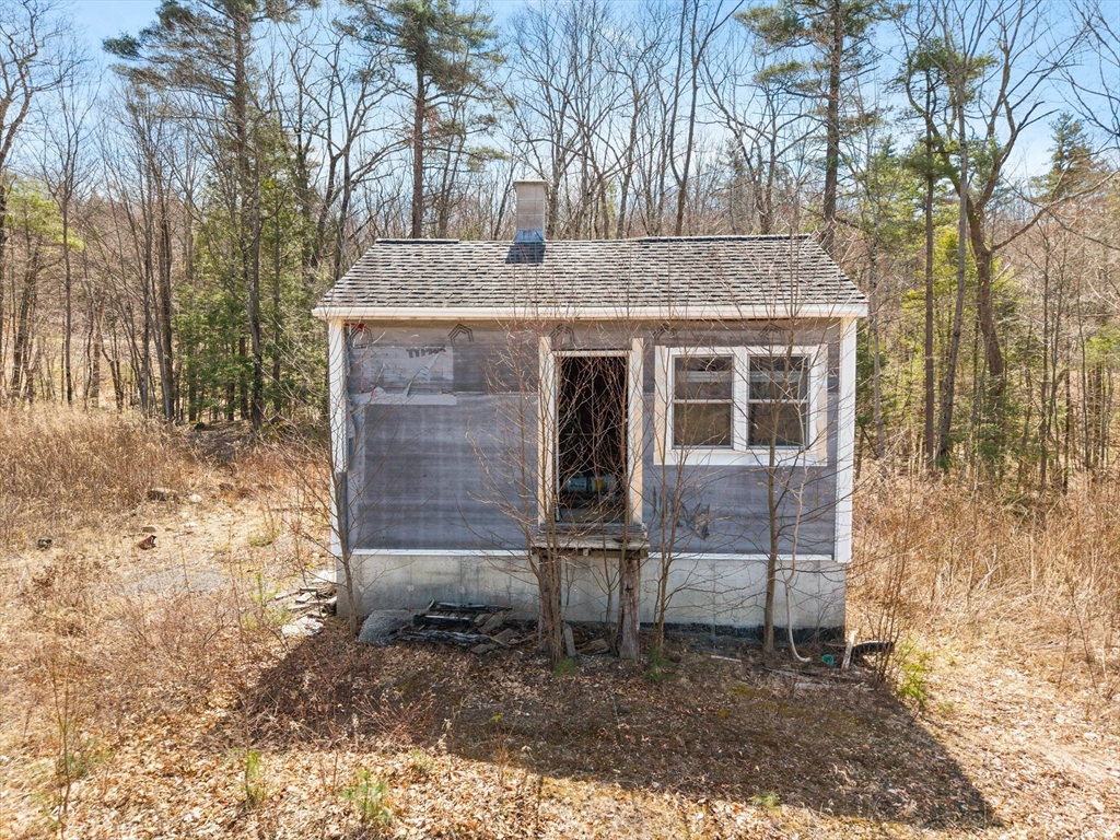 706 Petersham Road Athol, MA 01331 - Photo 8 of 10 a backyard of a house with table and chairs