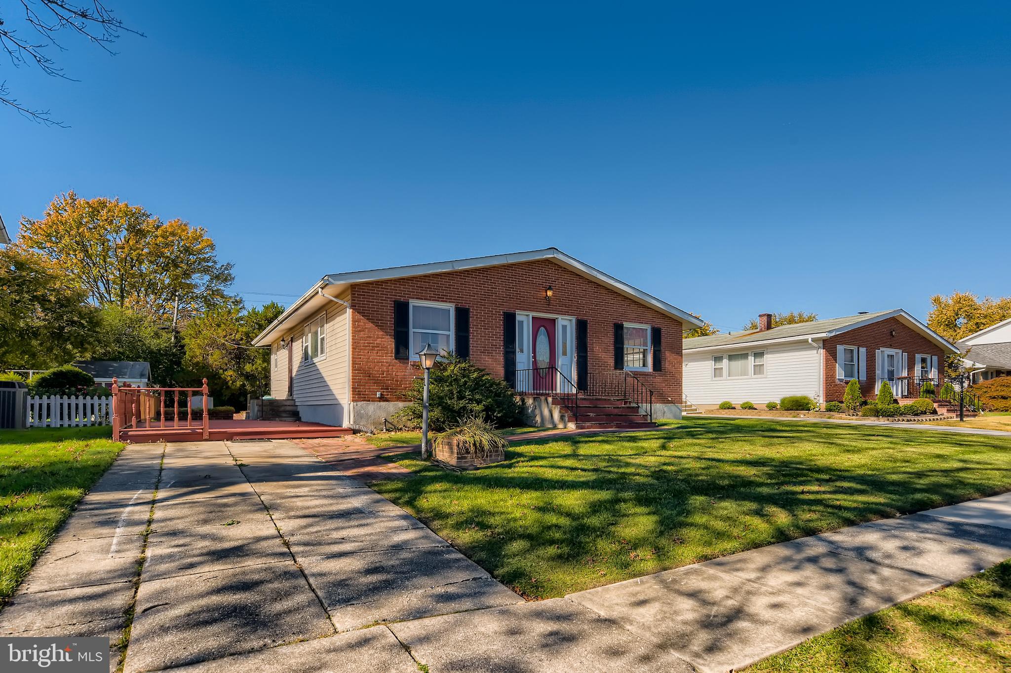 8918 Parlo Road Baltimore, MD 21236 - Photo 2 of 28 a front view of a house with a yard