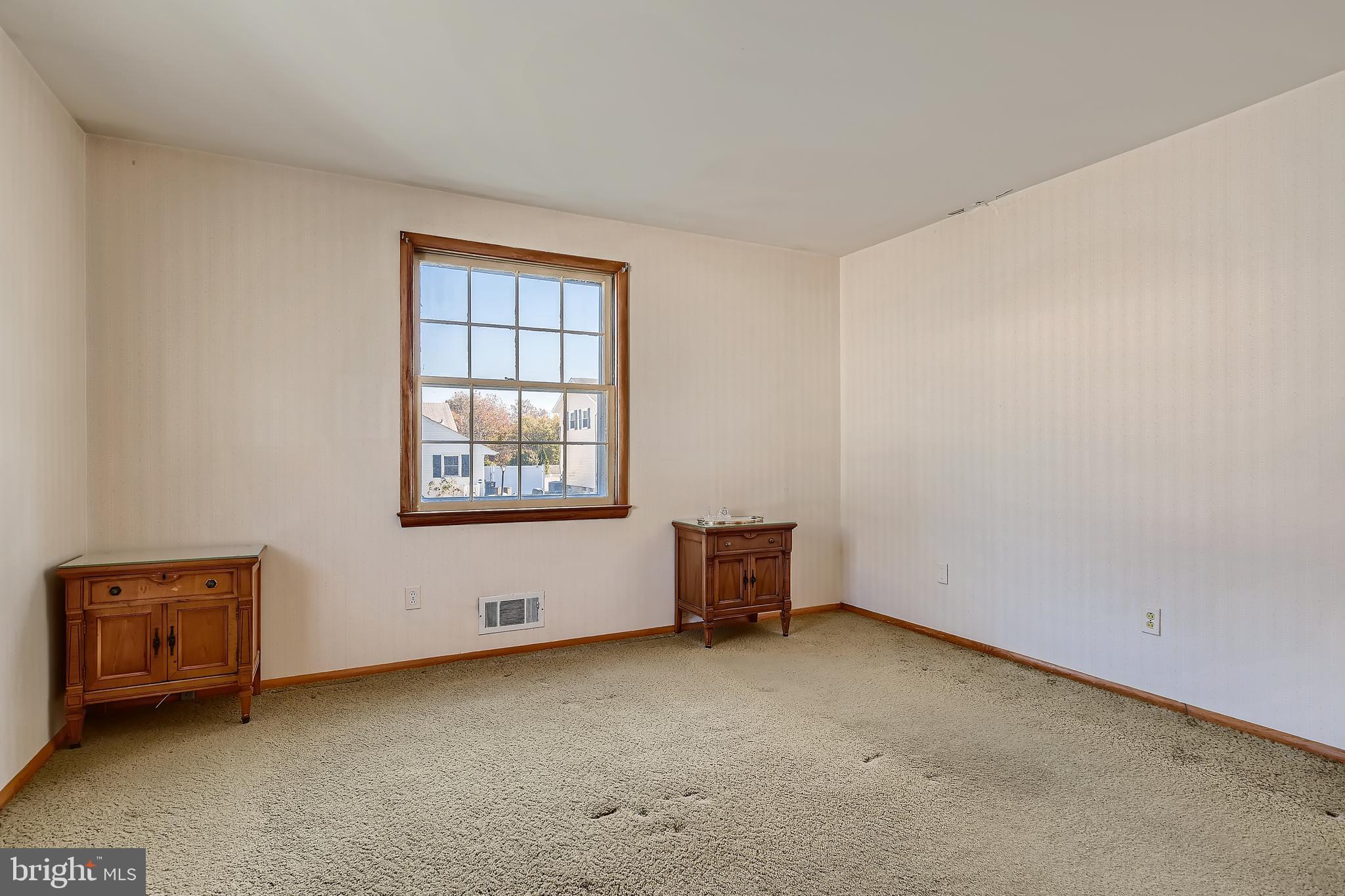 8918 Parlo Road Baltimore, MD 21236 - Photo 12 of 28 a view of an empty room with a window