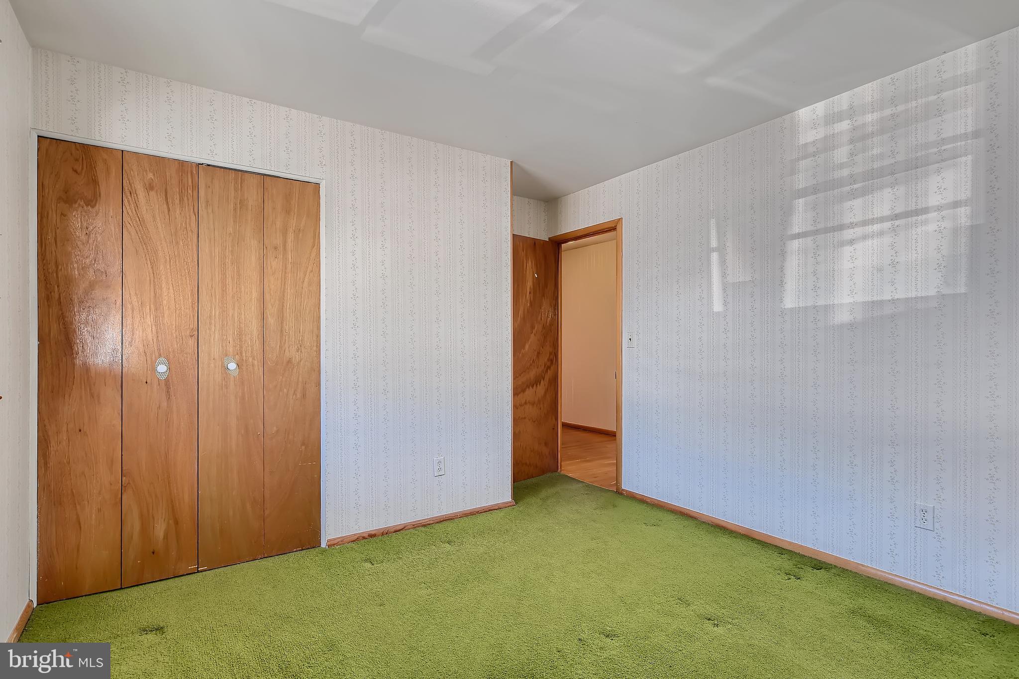8918 Parlo Road Baltimore, MD 21236 - Photo 15 of 28 an empty room with closet