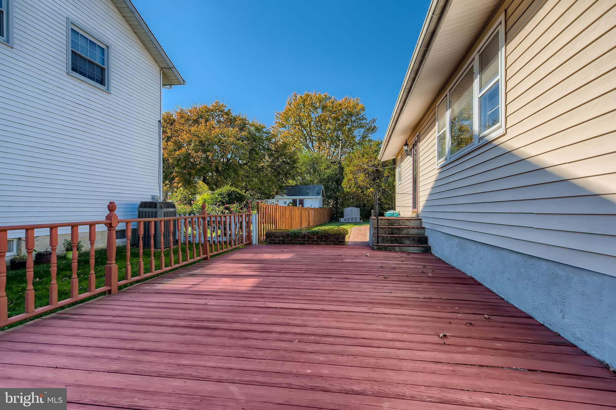 8918 Parlo Road Baltimore, MD 21236 - Photo 26 of 28 a view of a deck with a yard