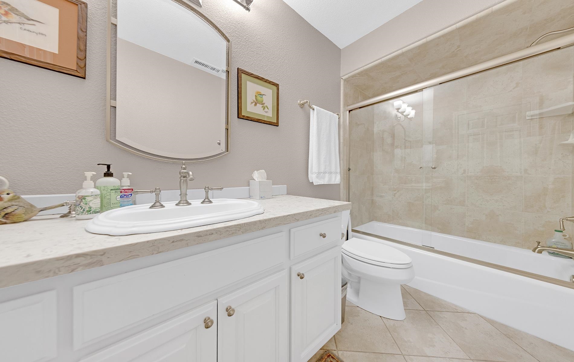 650 Wagon Road Chester, CA 96020 - Photo 18 of 36 a bathroom with a double vanity sink toilet and shower