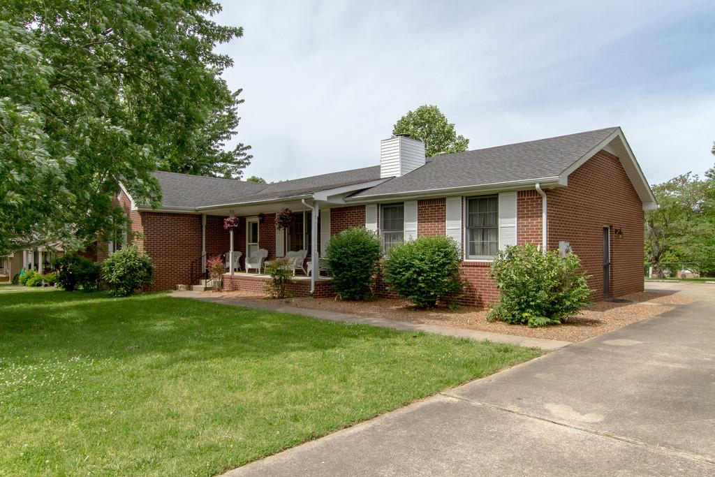 4002 Harding Place Springfield, TN 37172 - Photo 1 of 17 a view of a house with a yard and sitting area