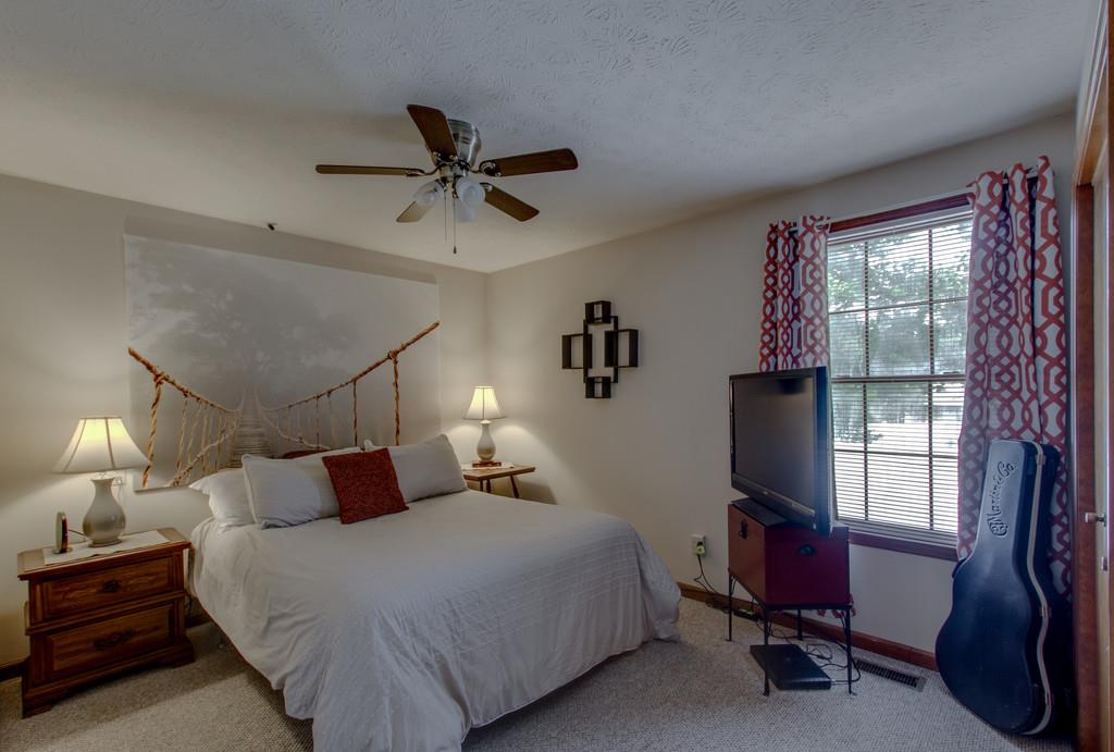 4002 Harding Place Springfield, TN 37172 - Photo 14 of 17 a bedroom with bed and window