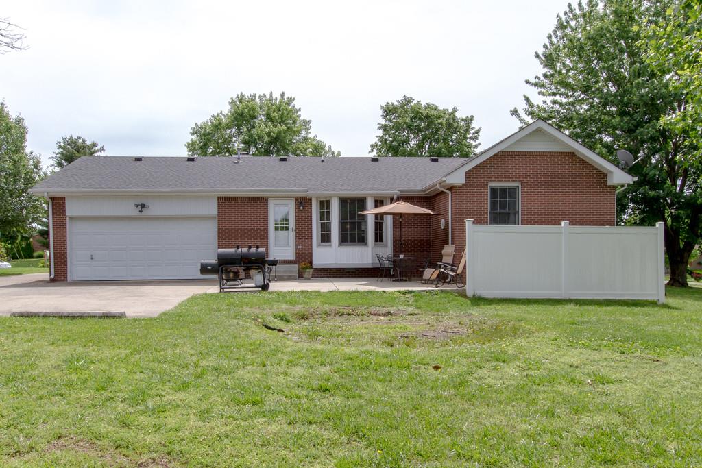 4002 Harding Place Springfield, TN 37172 - Photo 16 of 17 a house view with a sitting space and garden