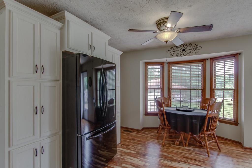 4002 Harding Place Springfield, TN 37172 - Photo 9 of 17 a view of a dining room with furniture window and wooden floor