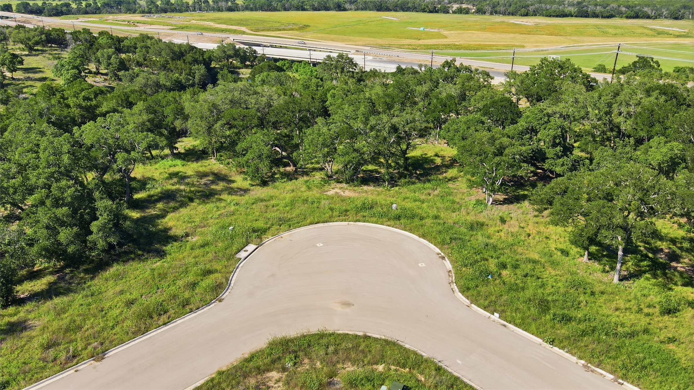152 West Rio Rnch Road Liberty Hill, TX 78642 - Photo 6 of 27 a view of a swimming pool with a yard