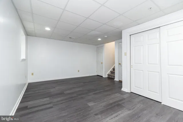 a view of a livingroom with wooden floor