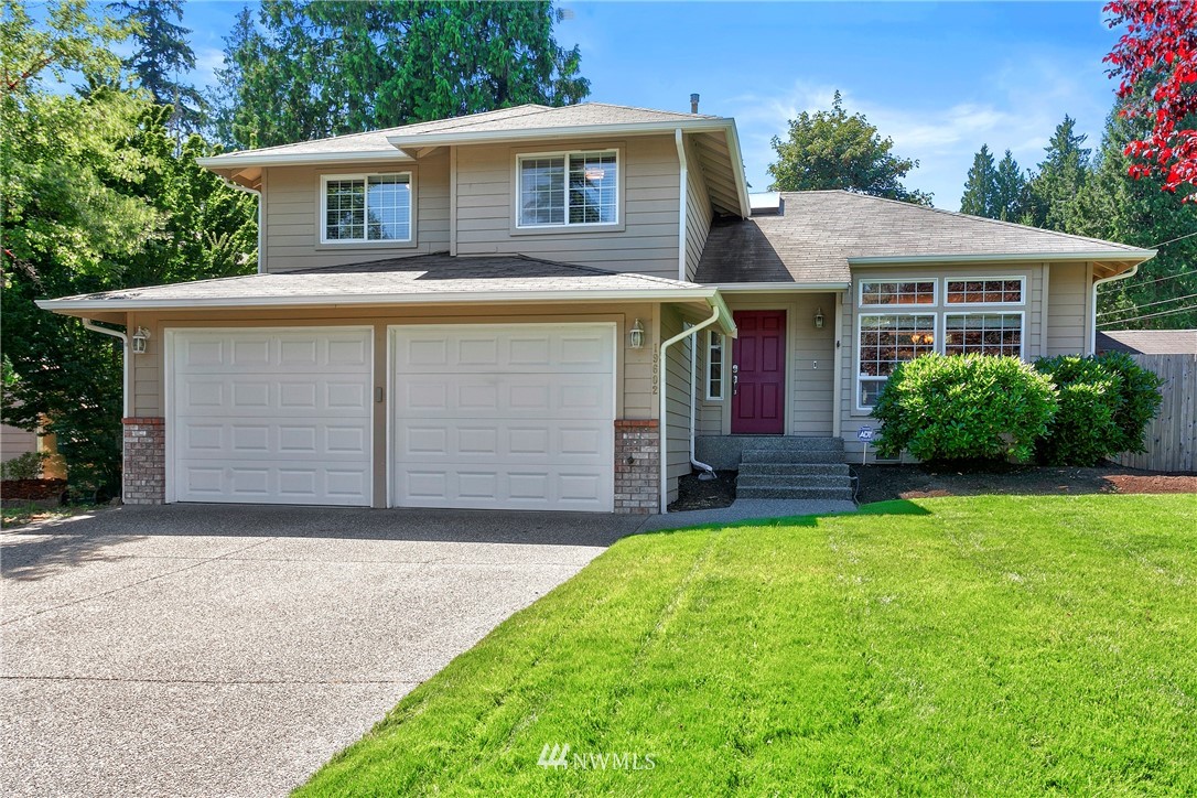 19602 9th Drive Southeast Bothell, WA 98012 - Photo 1 of 20 a front view of house with yard and garage