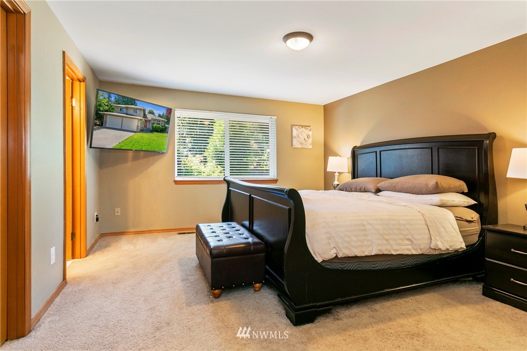 19602 9th Drive Southeast Bothell, WA 98012 - Photo 12 of 20 a bed room with a bed and a window
