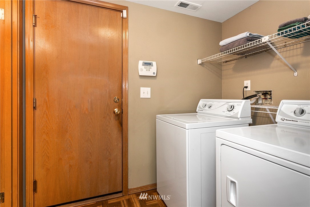 19602 9th Drive Southeast Bothell, WA 98012 - Photo 17 of 20 a utility room with dryer and washer