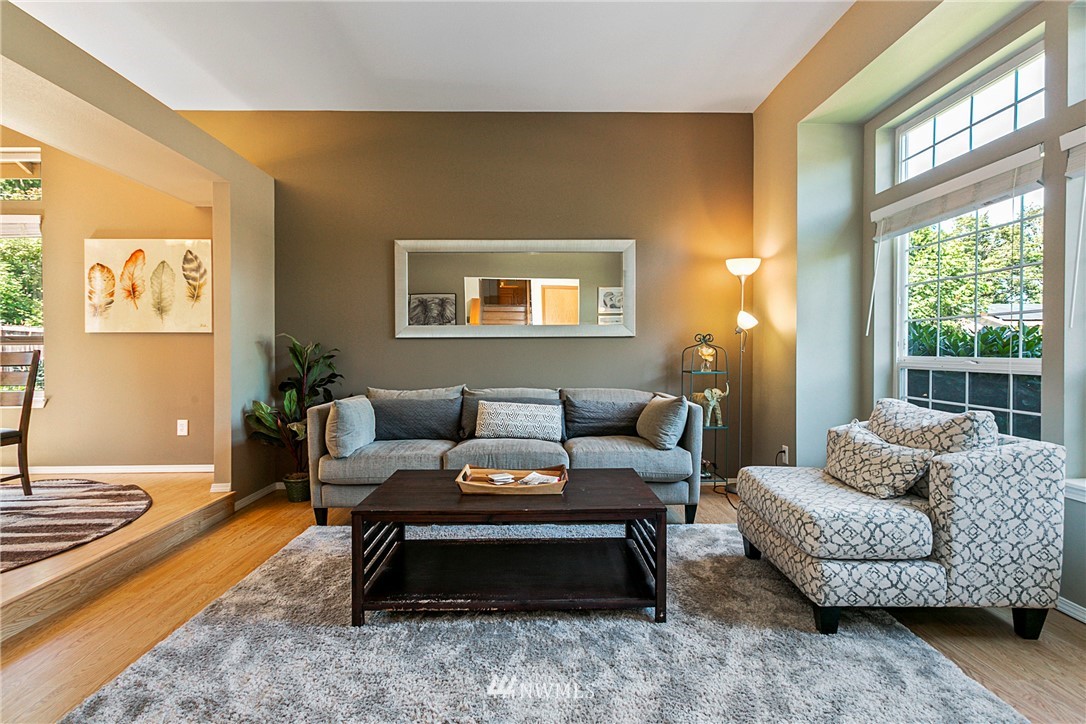 19602 9th Drive Southeast Bothell, WA 98012 - Photo 5 of 20 a living room with furniture and a large window