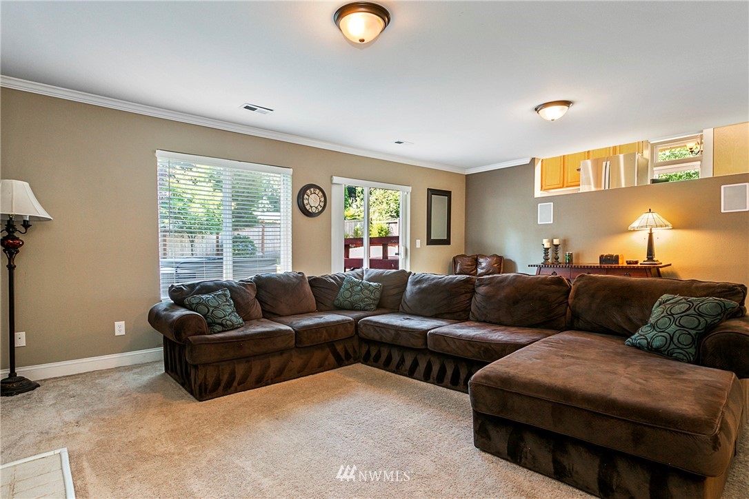 19602 9th Drive Southeast Bothell, WA 98012 - Photo 10 of 20 a living room with couches and painted walls next to a window
