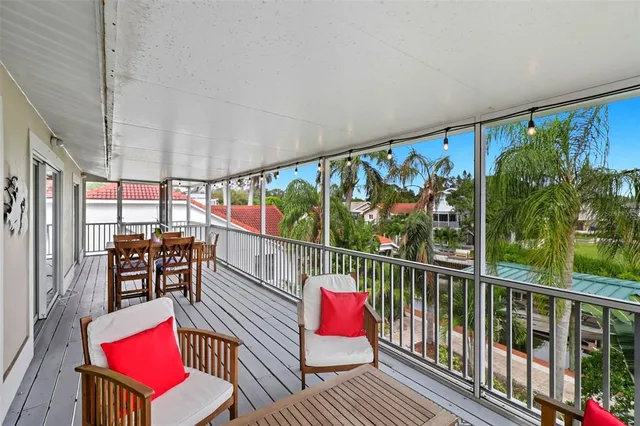 a view of a porch with furniture