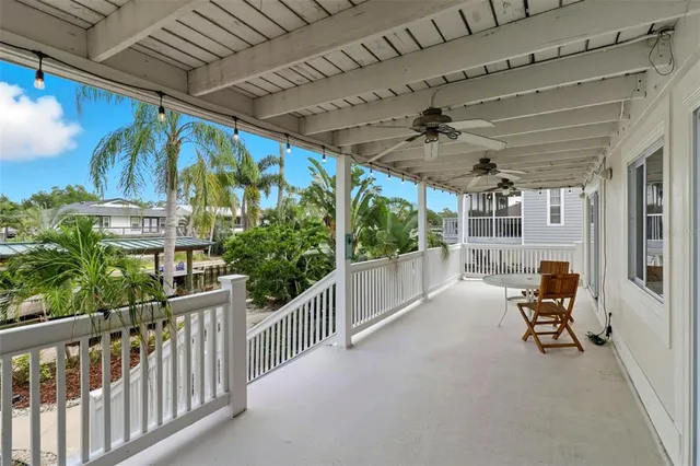 a view of a chairs and table in a patio