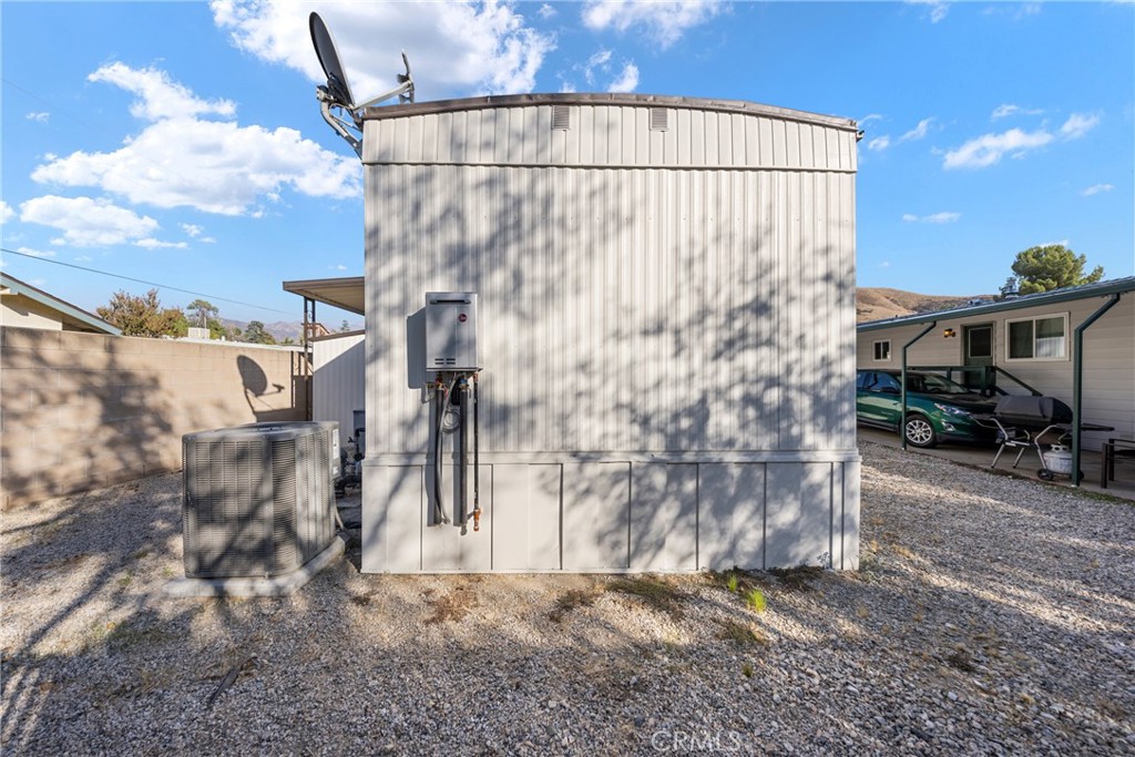 1255 Amethyst Street, Unit 51 Mentone, CA 92359 - Photo 35 of 60 a view of outdoor area with wooden fence