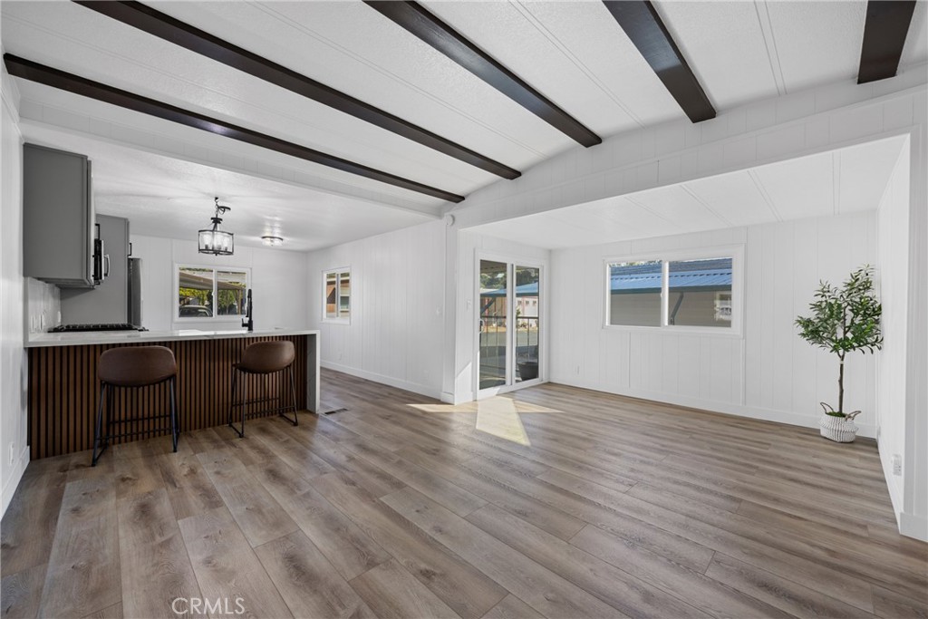 1255 Amethyst Street, Unit 51 Mentone, CA 92359 - Photo 5 of 60 a view of workspace with wooden floor