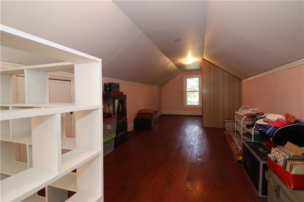 418 Pine Hill Road Kittanning, PA 16201 - Photo 14 of 20 a view of a hallway with wooden floor and stairs