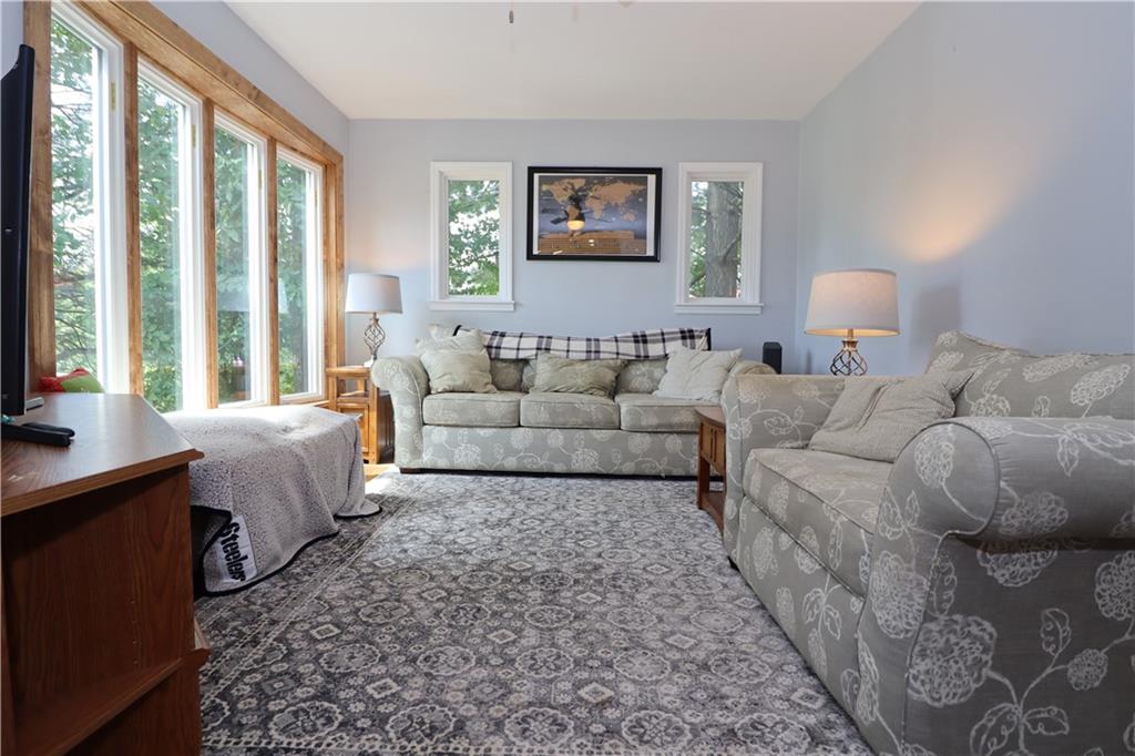 418 Pine Hill Road Kittanning, PA 16201 - Photo 10 of 20 a living room with a couch and a window