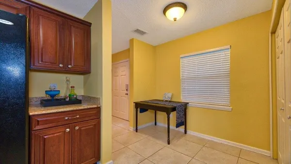 a kitchen with stainless steel appliances granite countertop a sink and cabinets