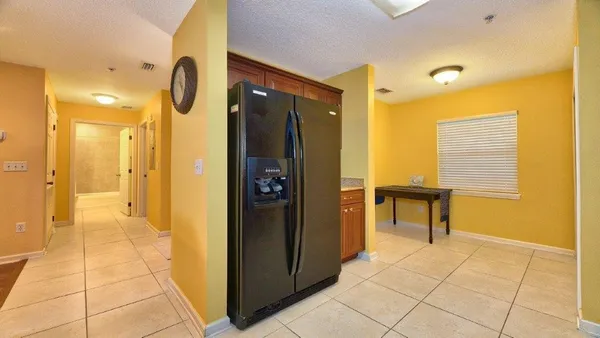 a bathroom with a glass shower door and a shower