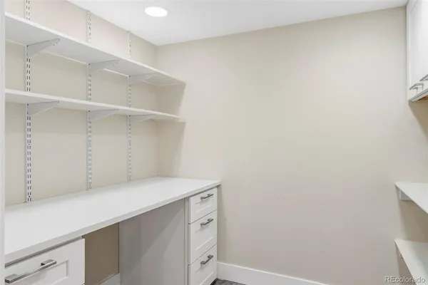 a utility room with sink dryer and washer