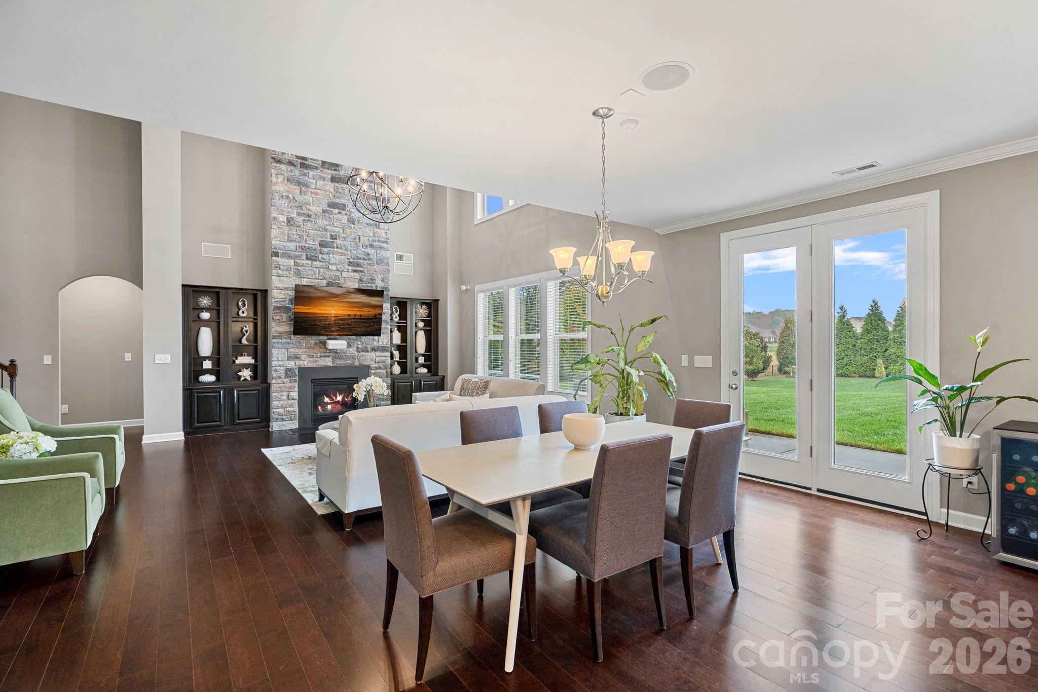 706 Blaise Court Matthews, NC 28104 - Photo 19 of 48 a view of a dining room with furniture window and wooden floor