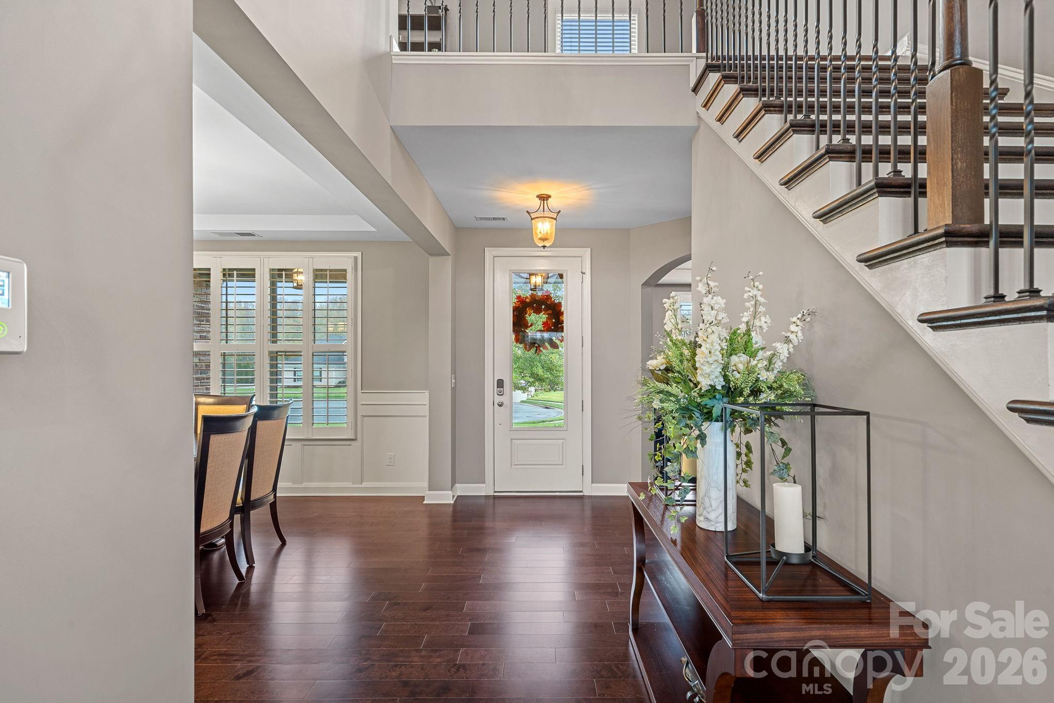 706 Blaise Court Matthews, NC 28104 - Photo 2 of 48 a workspace with wooden floor